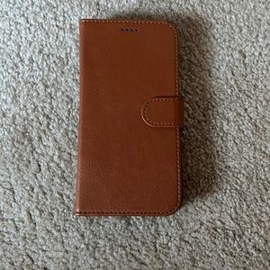 Brown-leather iPhone 11 wallet case.